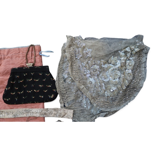 8022 - A collection of bags including beadwork reticules; leather and suede gloves, a sequin embroidered tu... 