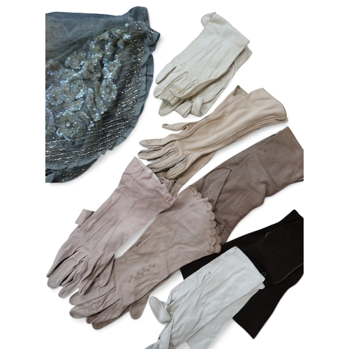 8022 - A collection of bags including beadwork reticules; leather and suede gloves, a sequin embroidered tu... 