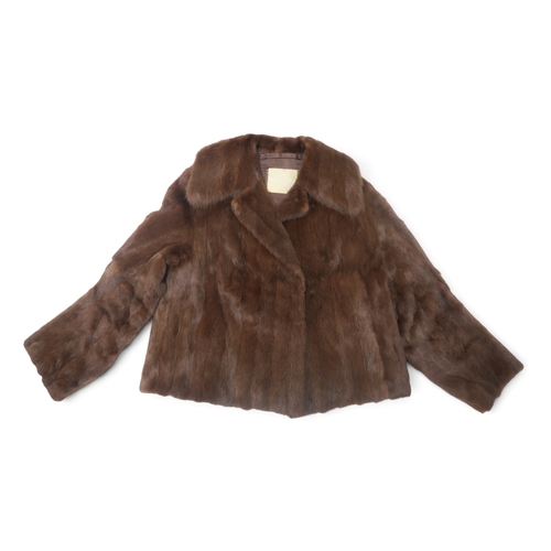 8023 - A lynx fur stole with pink silk satin lining and a short brown fur jacket (2)