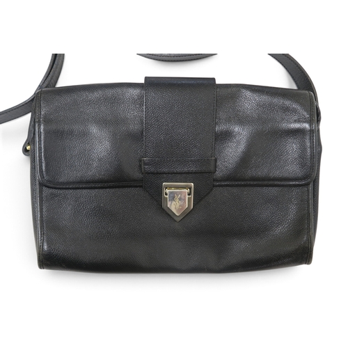 8044 - A vintage Yves Saint Laurent black grained leather handbag with flap closure and a dark brown crocod... 