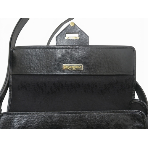 8044 - A vintage Yves Saint Laurent black grained leather handbag with flap closure and a dark brown crocod... 