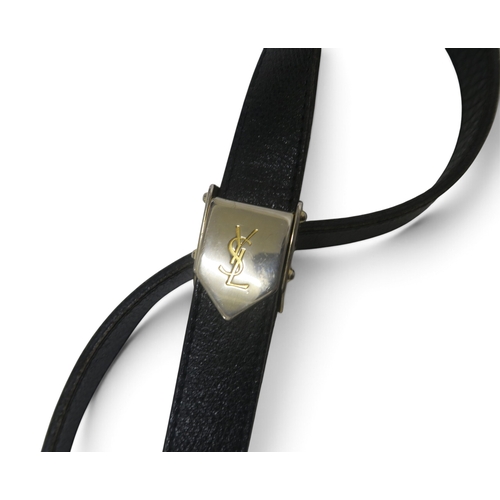 8044 - A vintage Yves Saint Laurent black grained leather handbag with flap closure and a dark brown crocod... 