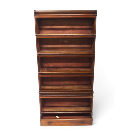 2002 - AN EARLY 20TH CENTURY MAHOGANY FIVE TIER SECTIONAL BOOKCASE&nbsp;with five glazed front sections on ... 