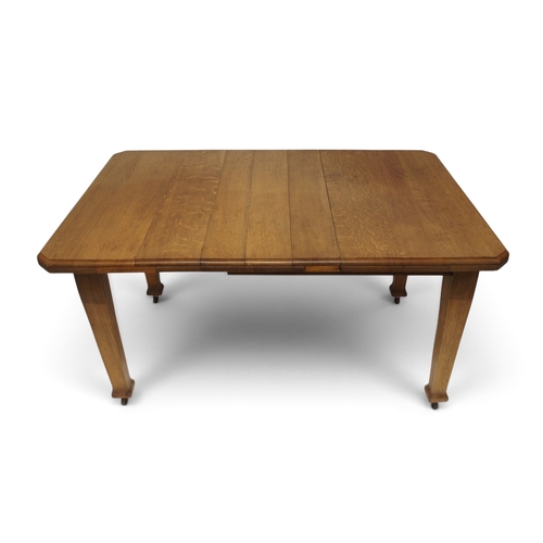 2007 - A LATE 19TH CENTURY OAK ARTS & CRAFTS DINING TABLE AND SIX CHAIRSextending dining table with sin... 