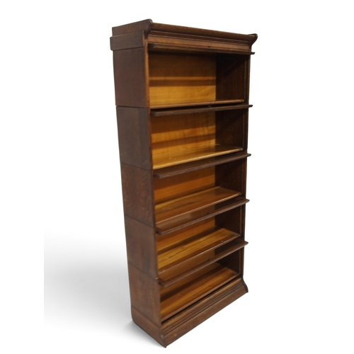 2008 - AN EARLY 20TH CENTURY OAK FIVE TIER SECTIONAL BOOKCASE&nbsp;with five glazed front sections on plint... 