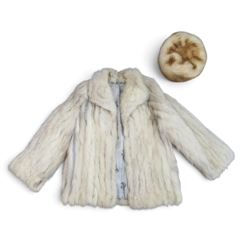 8001 - An arctic fox white fur coat with grey suede panels; together with a fur hat (2)bust (laid flat) 50c... 
