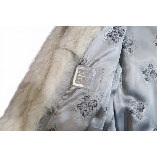 8001 - An arctic fox white fur coat with grey suede panels; together with a fur hat (2)bust (laid flat) 50c... 