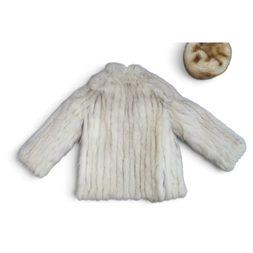 8001 - An arctic fox white fur coat with grey suede panels; together with a fur hat (2)bust (laid flat) 50c... 