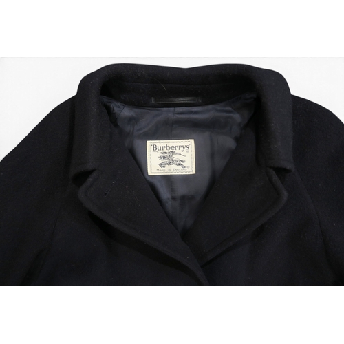 8026 - A vintage Burberry raglan coat in black wool and camel hair, lined in black viscosechest approx. 50c... 
