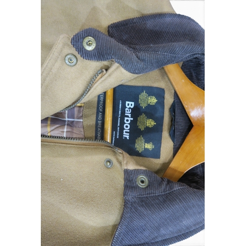 8027 - A houndstooth check Aquascutum jacket with gold coloured buttons, a pale blue Aquascutum short coat,... 