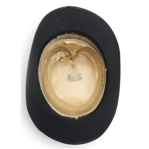 8047 - A Lincoln Bennett bowler hat of large proportions, measuring 20.6cm front-to-back internally, and 16... 