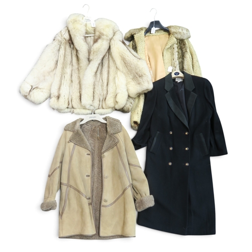 8049 - An arctic fox jacket by Giddings Furs Harrow; together with an Astraka faux fur coat, a wool and cas... 