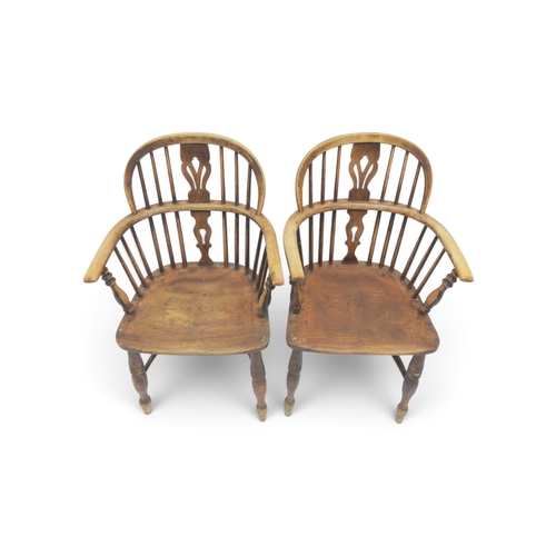 2012 - A PAIR OF 19TH ASH & ELM FRAMED WINDSOR ARMCHAIRS&nbsp;with pierced fret cut splats amongst rail... 