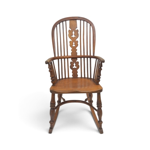 2013 - A 19TH ASH & ELM FRAMED WINDSOR ROCKING CHAIR&nbsp;with pierced fret cut splat amongst railed ho... 