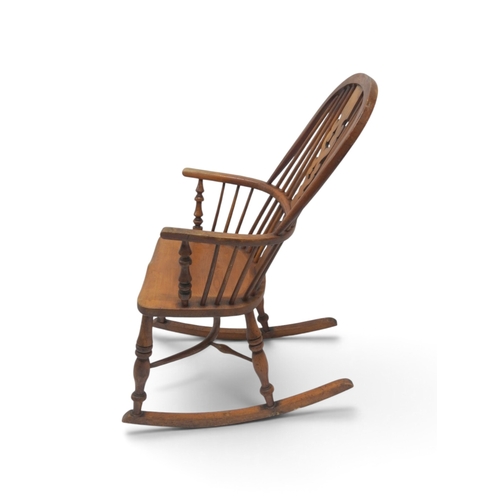 2013 - A 19TH ASH & ELM FRAMED WINDSOR ROCKING CHAIR&nbsp;with pierced fret cut splat amongst railed ho... 