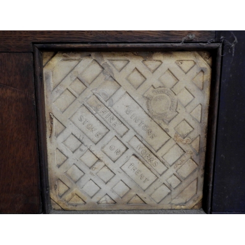 2017 - A LATE 19TH CENTURY OAK AND EBONISED ARTS & CRAFTS MIRROR BACKED HALLSTANDwith spindle mounted s... 