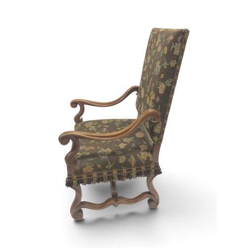 2018 - A 19TH CENTURY CONTINENTAL WALNUT FRAMED ARMCHAIR&nbsp;with floral upholstered back and seat flanked... 