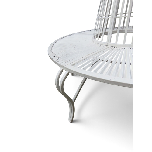 2029 - A 20TH CENTURY WHITE PAINTED CAST METAL CIRCULAR TREE SURROUND GARDEN BENCH&nbsp;with scrolled surmo... 