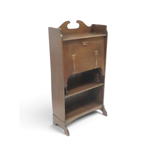 2030 - A LATE 19TH CENTURY OAK ARTS & CRAFT WRITING BUREAUwith galleried top over embossed copper mount... 