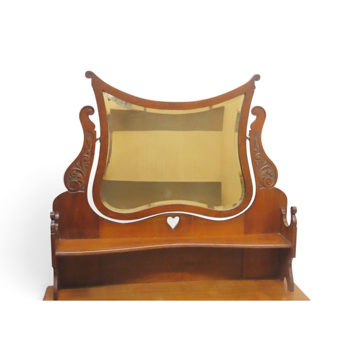 2031 - AN EARLY 20TH CENTURY MAHOGANY ART NOUVEAU TWO PIECE BEDROOM SUITEcomprising wardrobe with moulded c... 