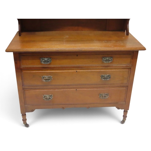 2031 - AN EARLY 20TH CENTURY MAHOGANY ART NOUVEAU TWO PIECE BEDROOM SUITEcomprising wardrobe with moulded c... 