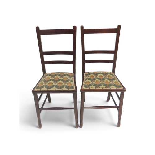 2032 - A PAIR OF 19TH CENTURY OAK FRAMED ARTS & CRAFTS BEDROOM CHAIRSwith pierced railed backs over str... 