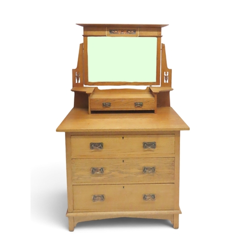 2033 - AN EARLY 20TH CENTURY OAK ARTS & CRAFTS TWO PIECE BEDROOM SUITEcomprising wardrobe with sloped c... 
