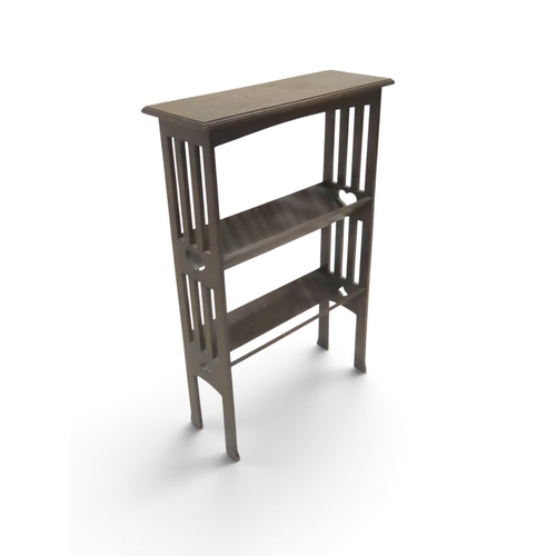 2034 - A LATE 19TH CENTURY OAK ARTS & CRAFTS BOOKCASE with rectangular top over two open book trough st... 