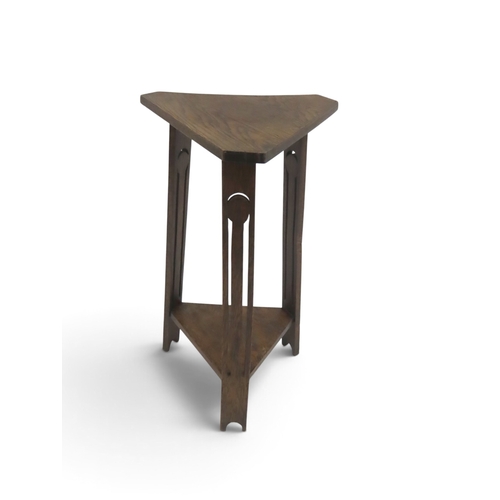 2034 - A LATE 19TH CENTURY OAK ARTS & CRAFTS BOOKCASE with rectangular top over two open book trough st... 