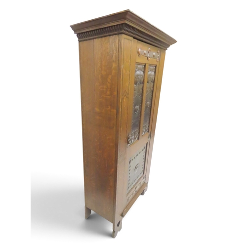 2035 - A 19TH CENTURY OAK ARTS & CRAFTS HALL ROBEwith moulded cornice over single panelled door inset w... 
