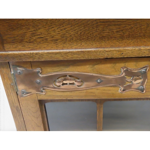 2039 - A 19TH CENTURY OAK ARTS & CRAFTS LADIES WRITING DESK&nbsp;with blue embossed skiver top over sin... 
