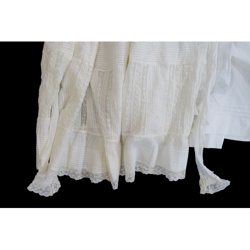8018 - A collection of whitework children's clothing including christening gowns