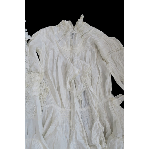8018 - A collection of whitework children's clothing including christening gowns