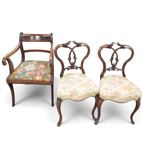 16 - A lot comprising a 20th century mahogany regency style sabre legged dining carver, a pair of cane ba... 