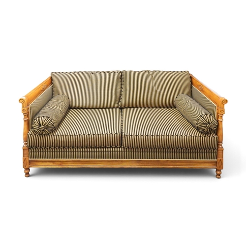 23 - A contemporary Balzarotti of Paris walnut framed French Empire style three seater settee with black ... 