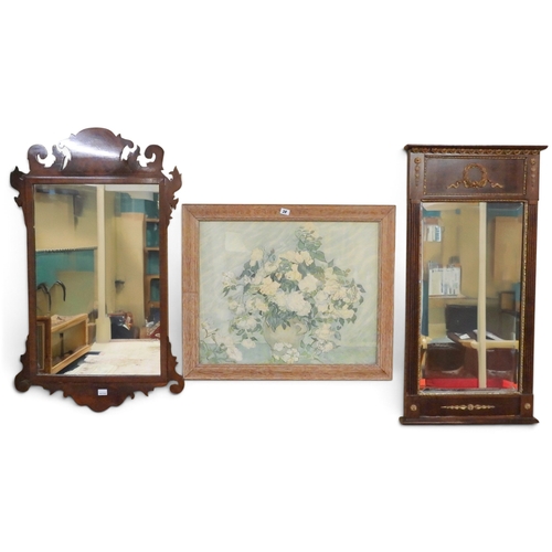 28 - A lot comprising a Georgian style walnut fret cut framed wall mirror, 79cm high x 47cm wide, a regen... 