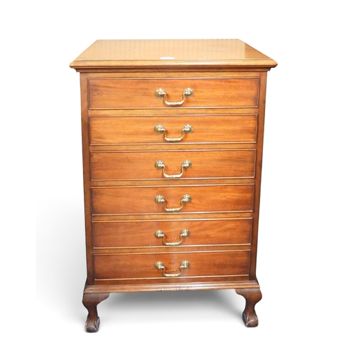 32 - A late 19th century mahogany narrow chest of drawers with six drawers with brass drawer pulls on bal... 