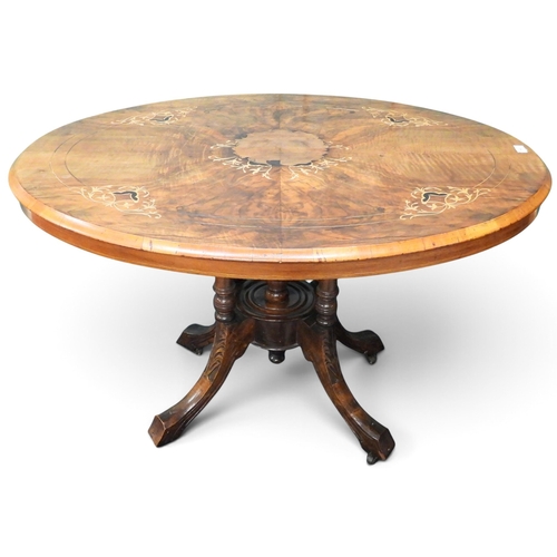 46 - A Victorian burr walnut veneered oval tilt top breakfast table on quadrupedal base, 72cm high x 116c... 