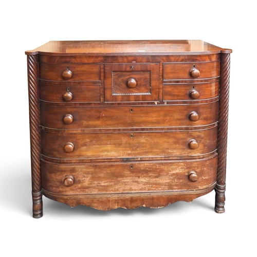 48 - A large Victorian mahogany veneered Scotch style chest with deep central drawer flanked by pairs of ... 