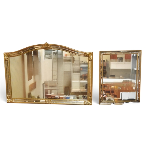 59 - A lot comprising a contemporary arched gilt framed overmantle mirror, 89cm high x 129cm wide and an ... 