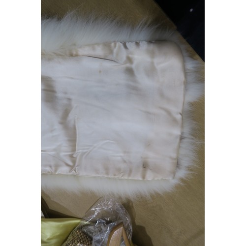 8000 - Circa 1950s ladies evening wear comprising a white fox stole, a silk gown with bead embroidery by Si... 
