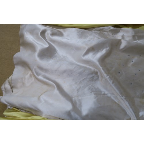8000 - Circa 1950s ladies evening wear comprising a white fox stole, a silk gown with bead embroidery by Si... 