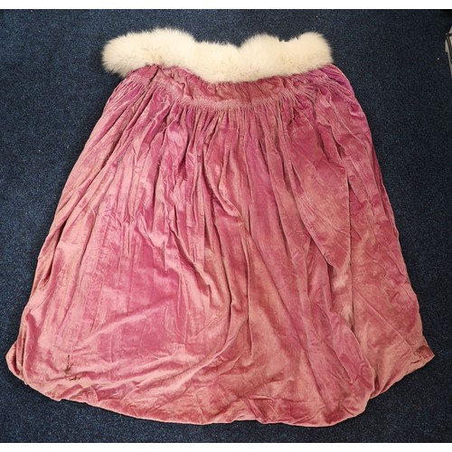 8005 - A circa 1930s pink silk velvet cape with white fox fur collar, lined with champagne satin; a blue si... 