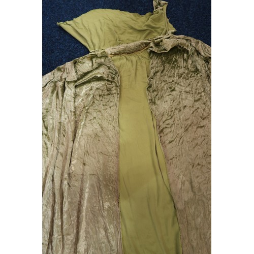 8005 - A circa 1930s pink silk velvet cape with white fox fur collar, lined with champagne satin; a blue si... 