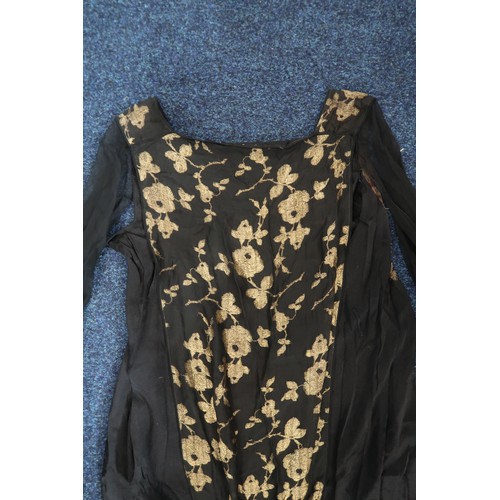 8006 - A 1920s black chiffon evening dress woven with metallic threads in floral design, with chiffon hangi... 