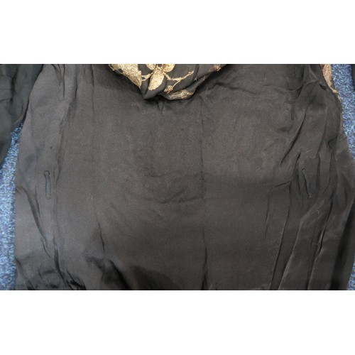 8006 - A 1920s black chiffon evening dress woven with metallic threads in floral design, with chiffon hangi... 