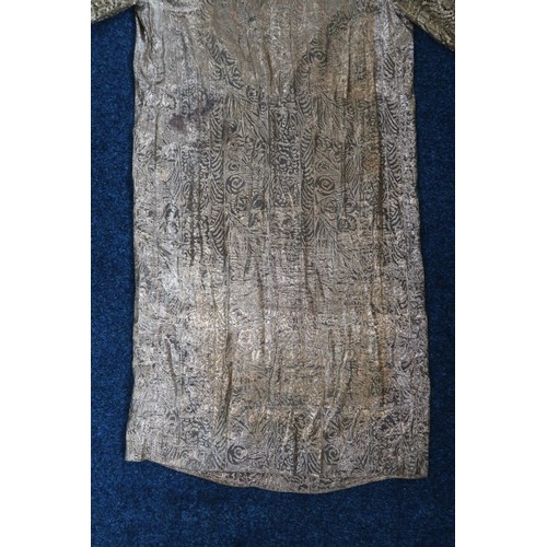 8006 - A 1920s black chiffon evening dress woven with metallic threads in floral design, with chiffon hangi... 