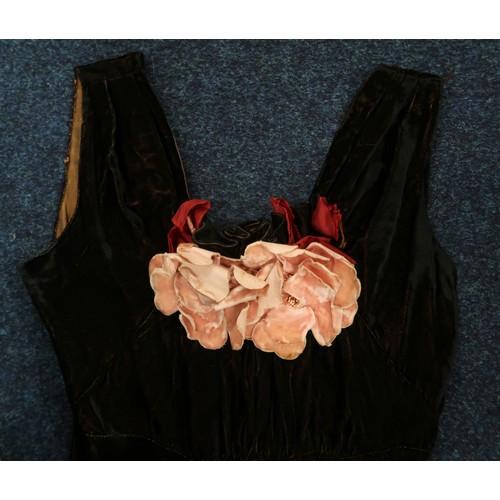 8007 - A 1930s black nacré velvet evening gown with applied velvet flower corsage by Reville London; togeth... 