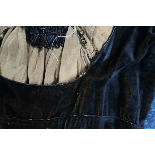 8007 - A 1930s black nacré velvet evening gown with applied velvet flower corsage by Reville London; togeth... 