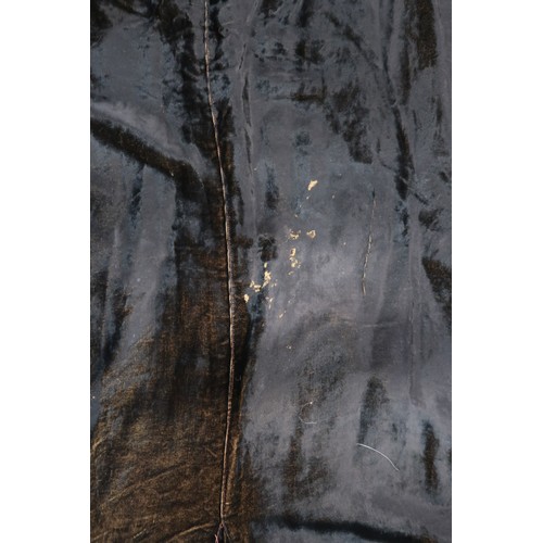 8007 - A 1930s black nacré velvet evening gown with applied velvet flower corsage by Reville London; togeth... 